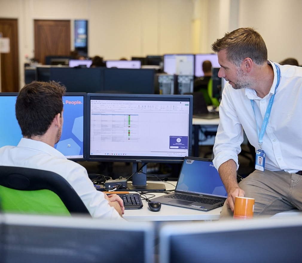 Two Engineers Working at a Computer